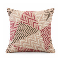 Primeval decorative throw cushion with beige, terracotta, and gray broken zigzag and maze-like shapes, shown against a white background