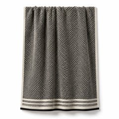 Black and cream herringbone jacquard cotton bath towel 70x140 cm on white background