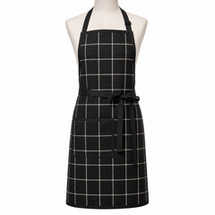 Primeval black and cream windowpane check chef apron displayed on a dress form
