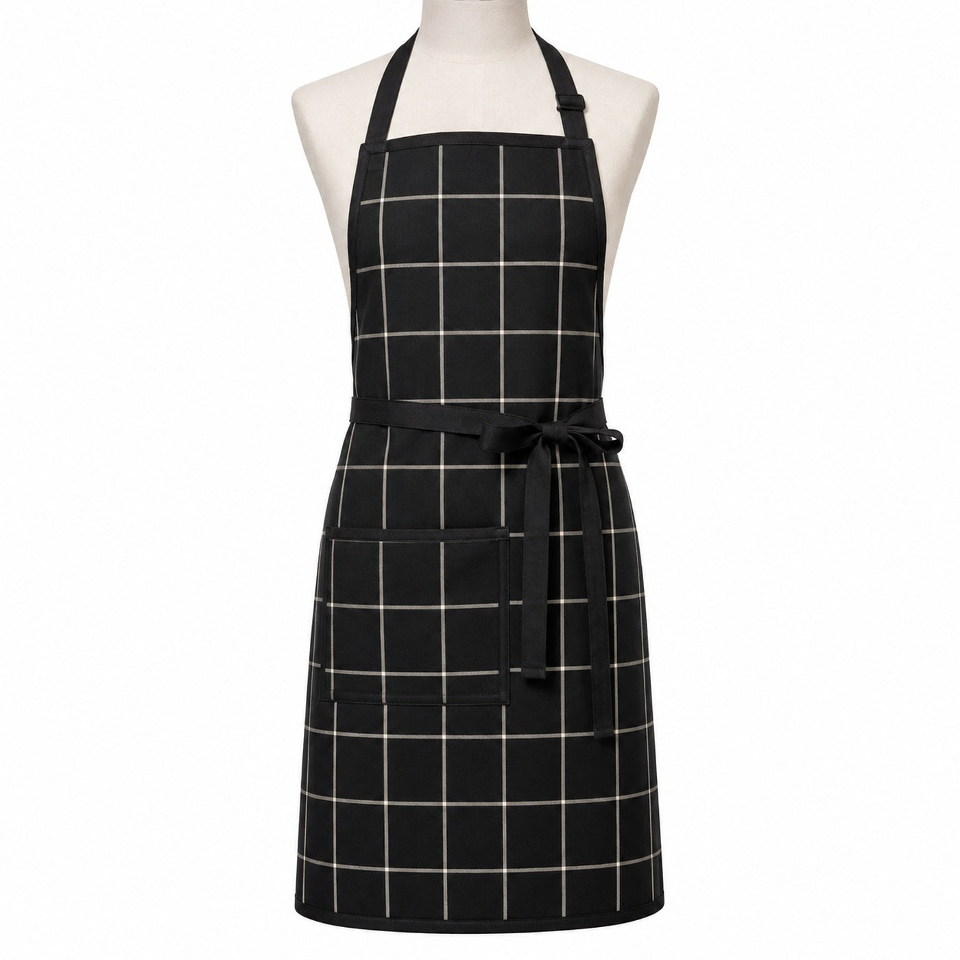 Primeval black and cream windowpane check chef apron displayed on a dress form