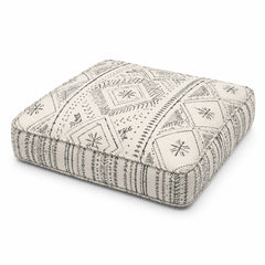 Black and ivory boho geometric square floor cushion on white background
