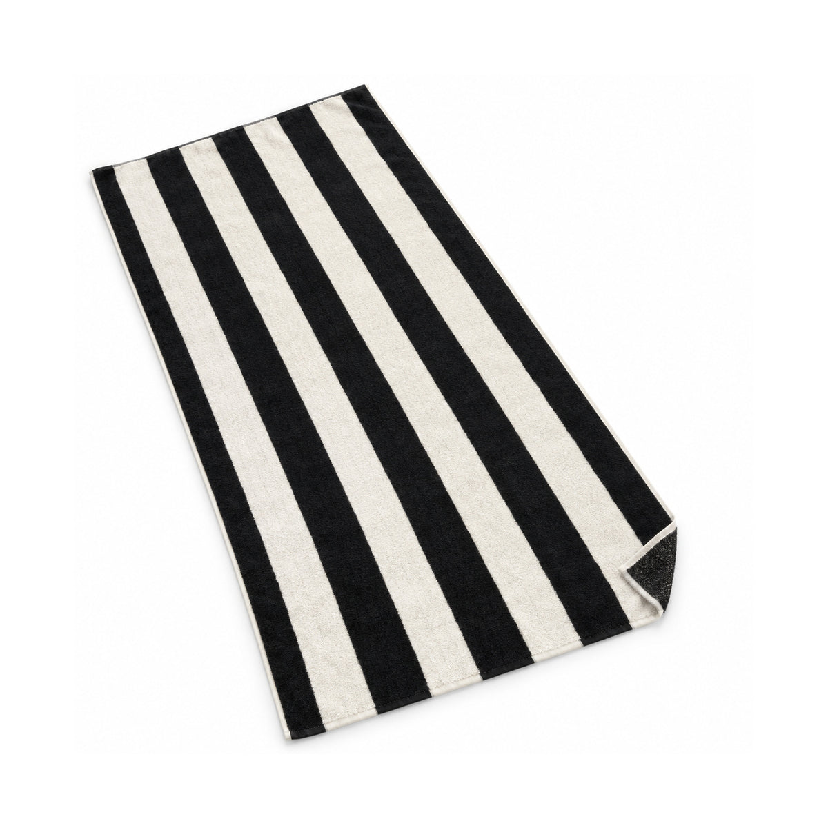 Black and ivory bold striped beach towel on a white background.
