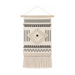 Black and ivory cotton macrame tapestry wall hanging with geometric diamond bands and fringe