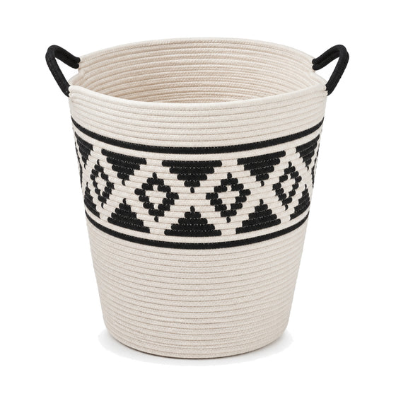Primeval black and ivory geometric laundry basket with black handles on a white background