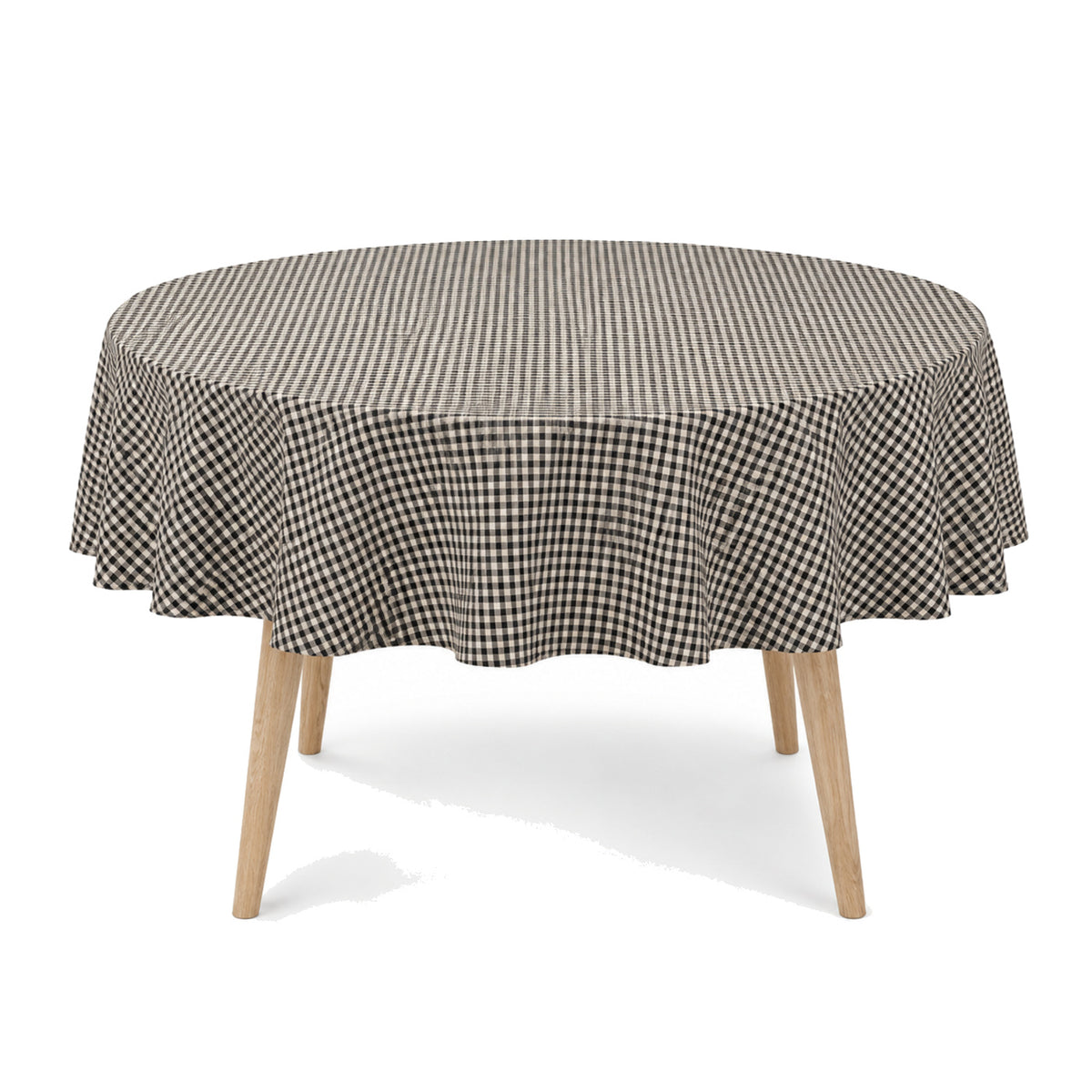 Primeval black natural small check tablecloth displayed on a round dining table