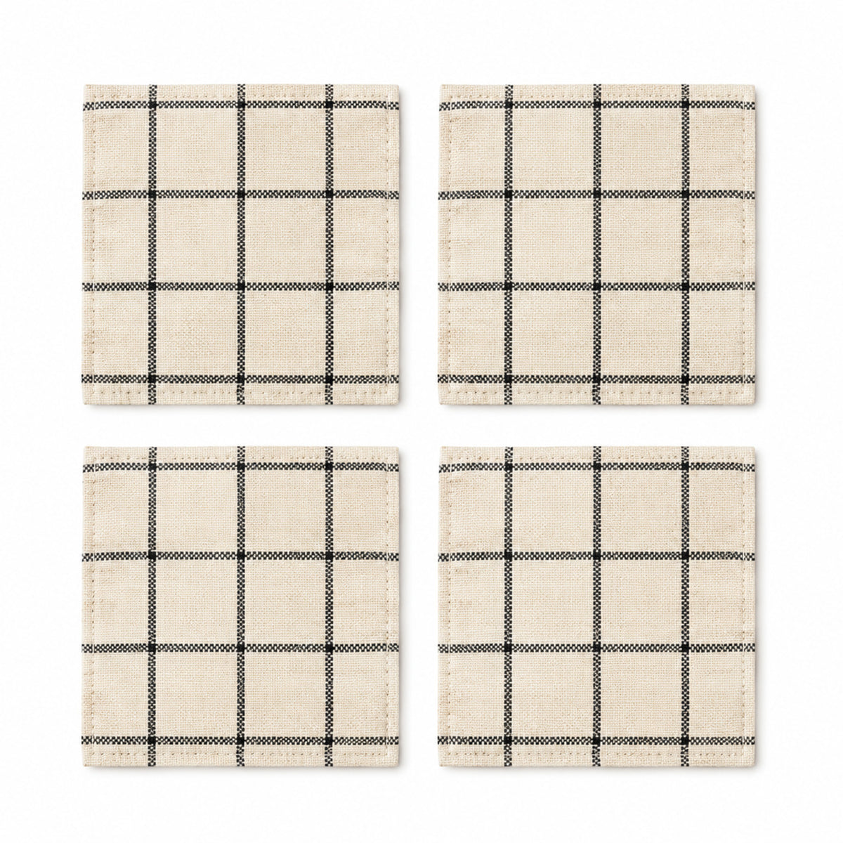 Black windowpane cotton coaster set on a clean white background