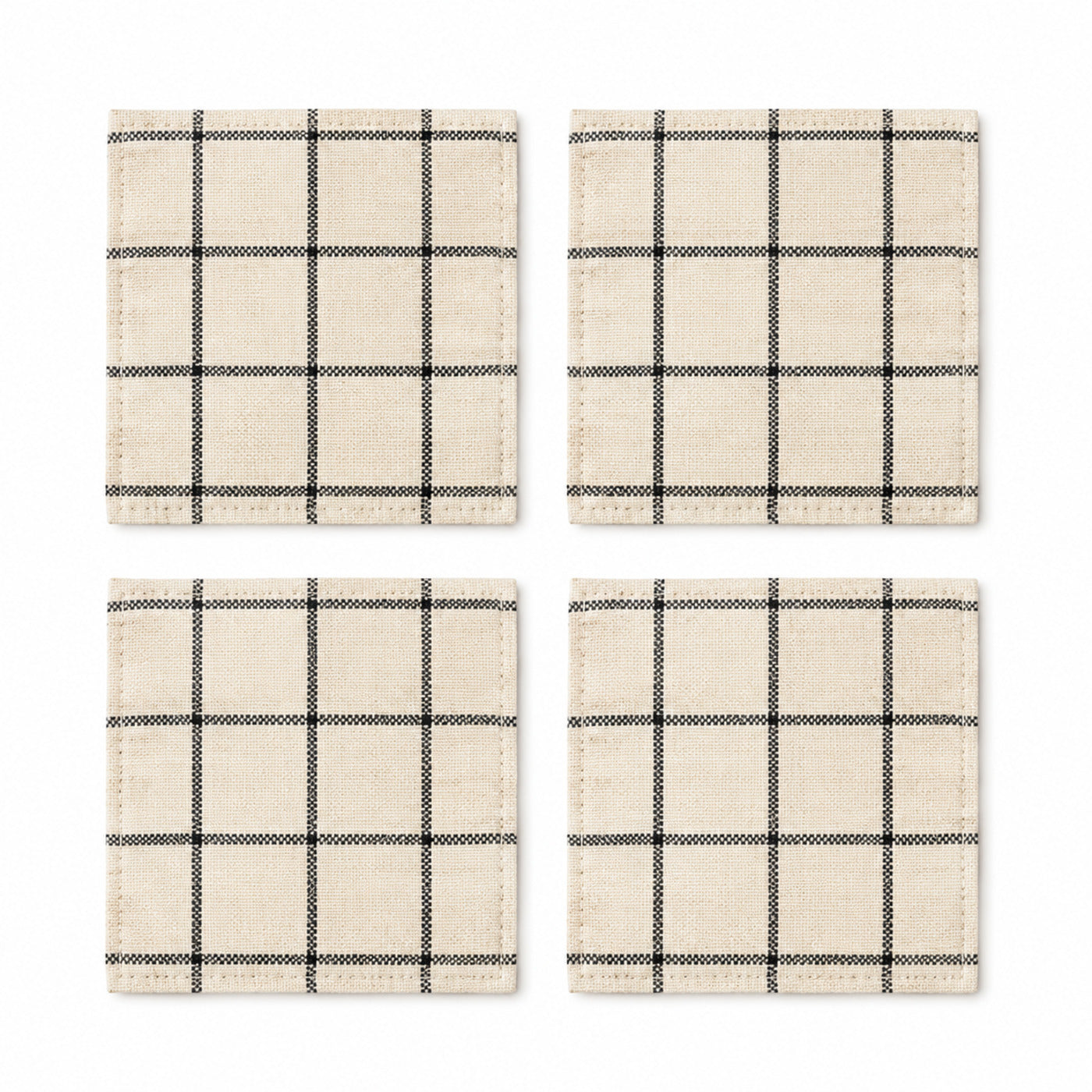 Black windowpane cotton coaster set on a clean white background