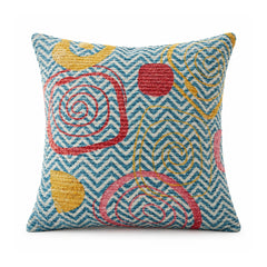 Primeval teal blue chevron cushion with coral pink mustard and aqua spiral circles and layered rounded motifs