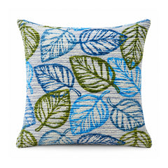 Primeval decorative throw cushion with blue and olive green outlined tropical leaves on a light background