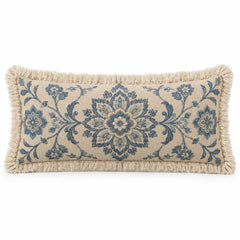 Ivory lumbar cushion cover with blue ornamental medallion pattern and fringed edges