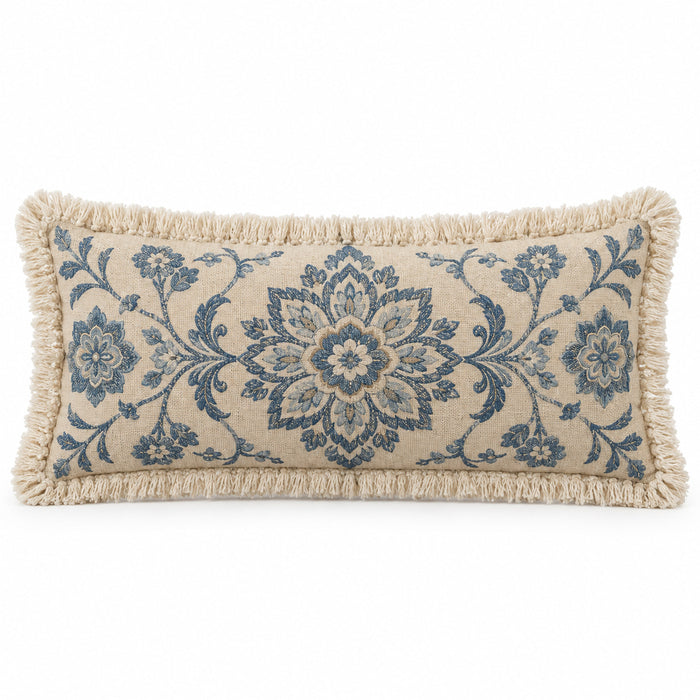 Ivory lumbar cushion cover with blue ornamental medallion pattern and fringed edges