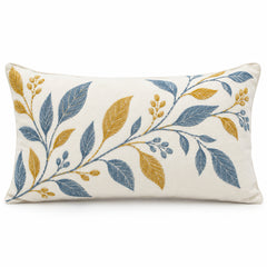 Ivory lumbar cushion cover with blue mustard and taupe botanical leaf branches