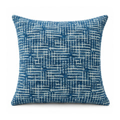 Primeval blue and white geometric cushion cover featuring intricately overlapping linear grid motifs