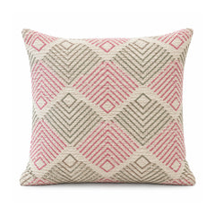 Primeval blush pink olive grey and ivory cushion with repeated chevron-filled diamonds and fine linear motifs
