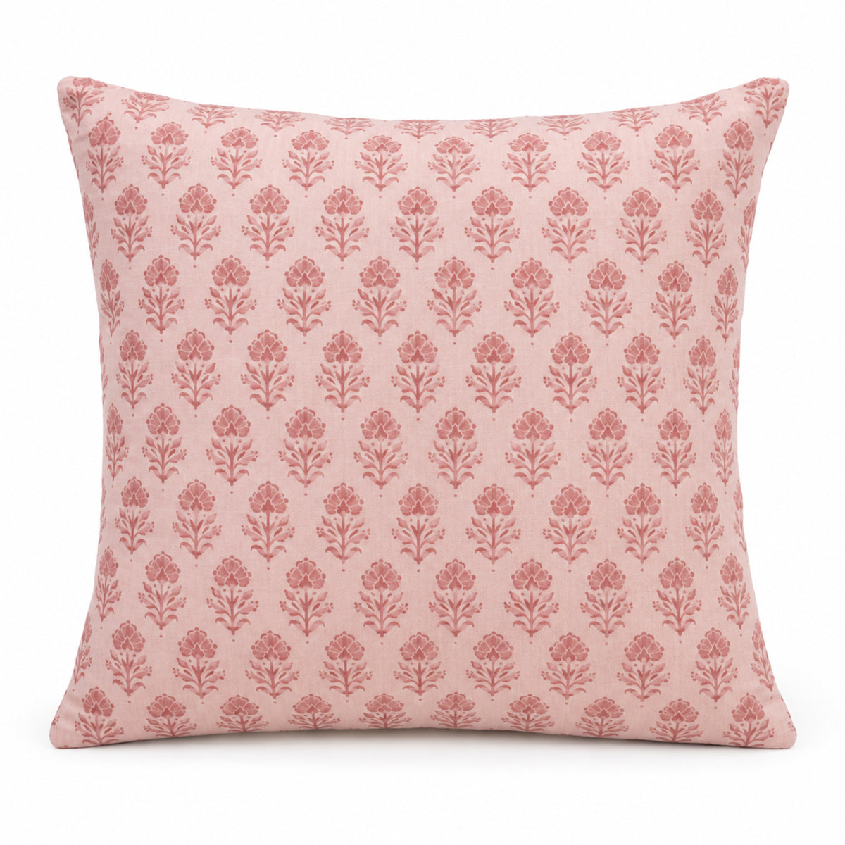 Blush pink decorative cushion cover with small repeating floral motif