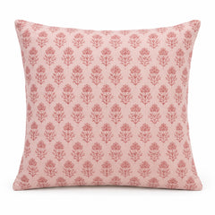 Blush pink decorative cushion cover with small repeating floral motif