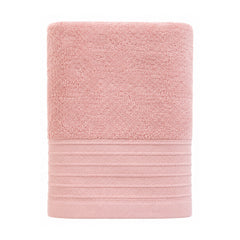 Blush pink textured towel for soft modern bathroom and spa collections