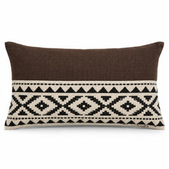 Brown lumbar cushion cover with bold ivory and black tribal geometric center band