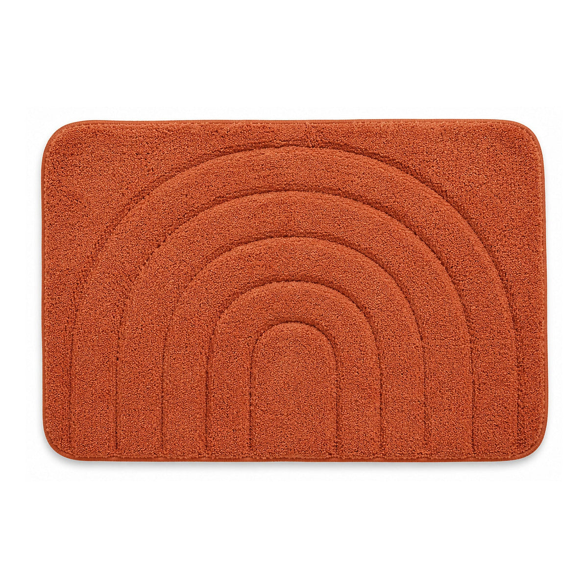 Burnt orange concentric arch textured bath mat on white background
