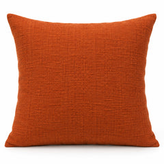 Burnt orange solid decorative cushion cover with textured woven surface