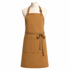 Primeval camel brown structured chef apron with front pockets displayed on a dress form