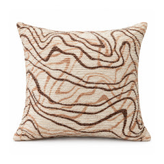 Primeval caramel brown and ivory cushion with abstract organic looping contour lines and sweeping waves