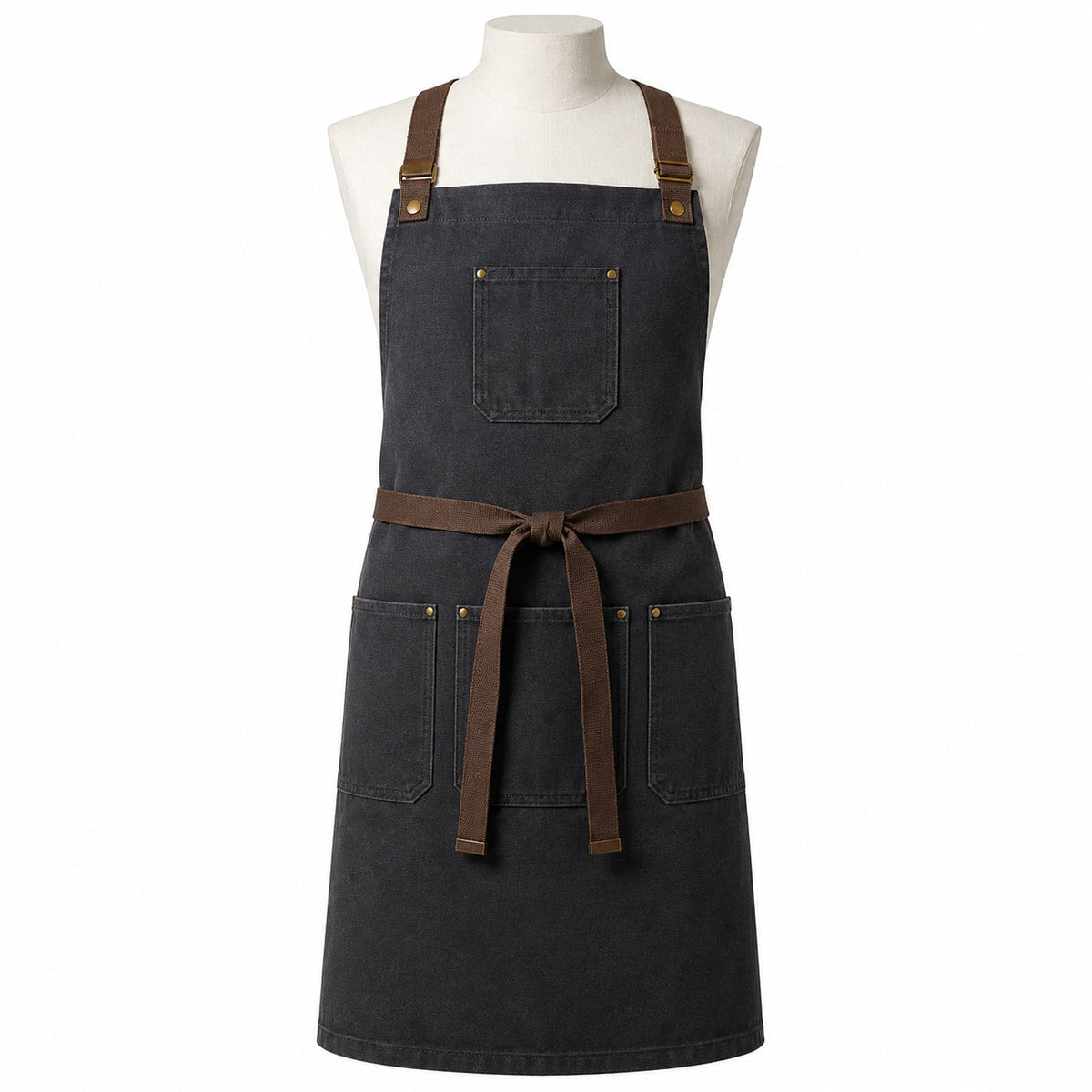 Primeval charcoal utility chef apron with brown straps displayed on a dress form