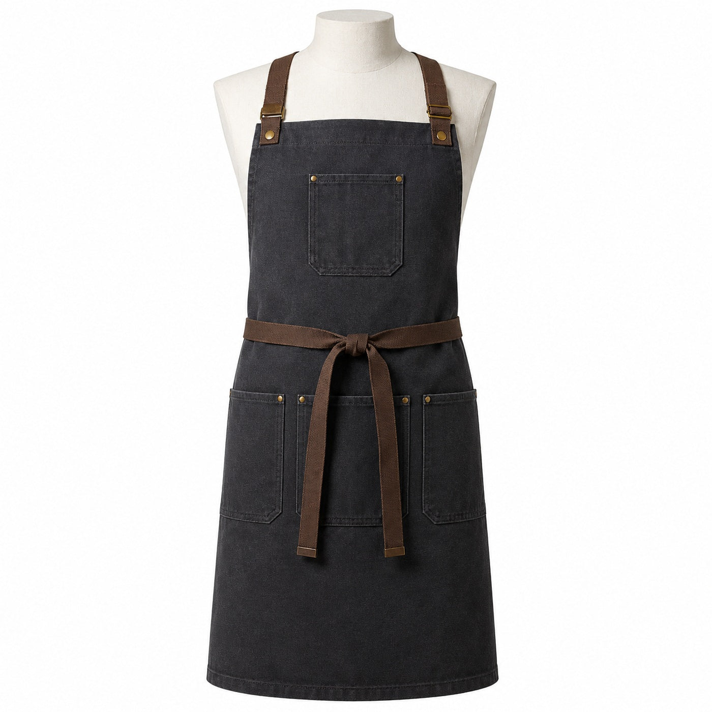 Primeval charcoal utility chef apron with brown straps displayed on a dress form