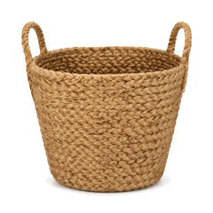 Primeval chunky braided natural jute laundry basket with loop handles on a white background
