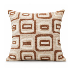 Primeval cinnamon brown and ivory cushion with repeating rounded rectangular retro geometric outlines