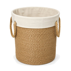Primeval natural jute laundry basket with cream cotton liner and rope handles on a white background