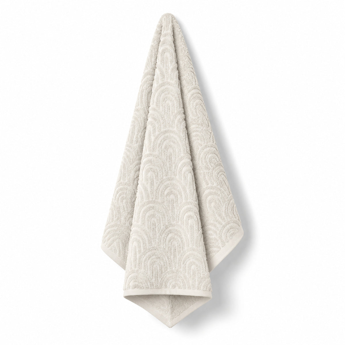 Cream arch tufted cotton bath towel 70x140 cm on white background