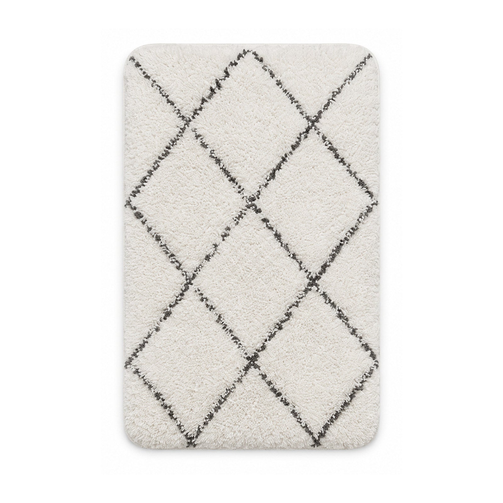 Cream shag bath mat with charcoal trellis pattern on white background