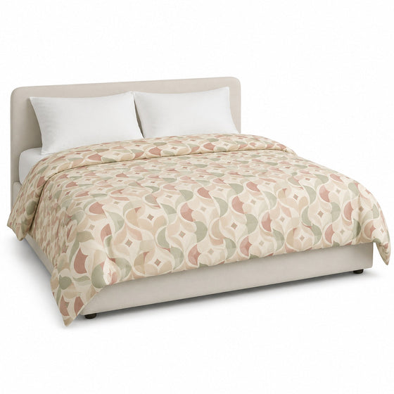 Primeval cream dusty rose beige and sage geometric duvet cover displayed on a styled bed against a clean white studio background