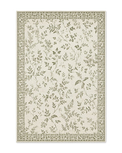 Cream and olive printed area rug with delicate botanical vines and decorative border on a white background.