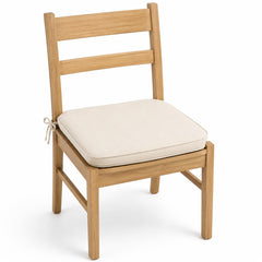 Primeval cream plain piped dining chair pad with tie straps on wooden dining chair