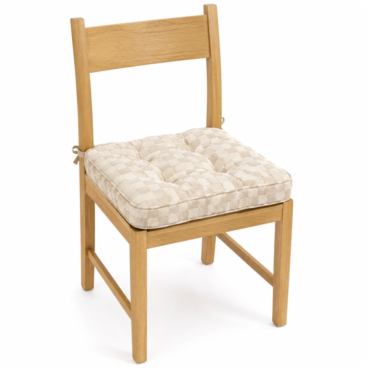 Primeval cream plush tufted dining chair pad with tie straps on wooden dining chair