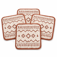 Cream rust tribal tufted coaster set on a clean white background