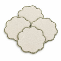 Cream scalloped coaster set with sage edge on a clean white background