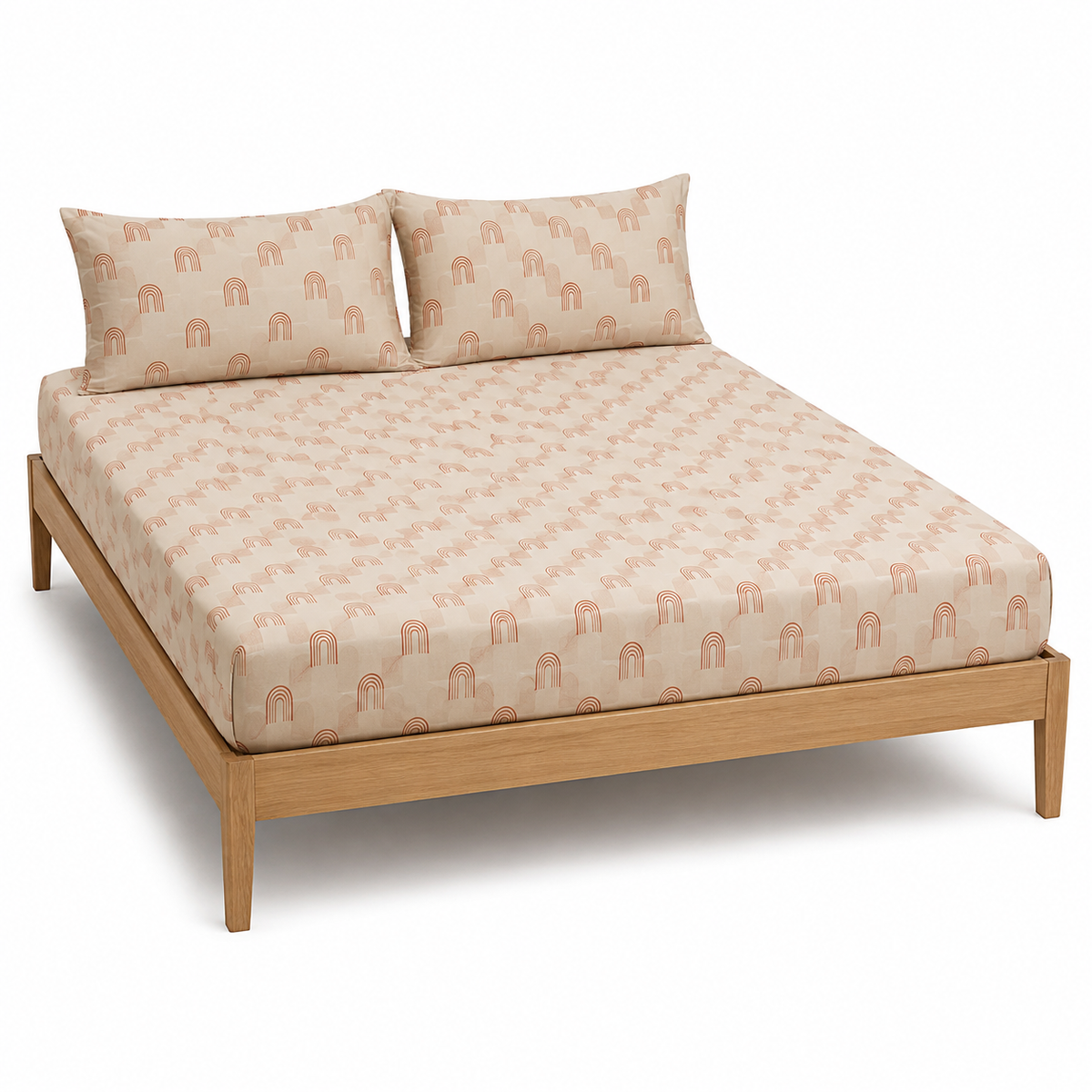 Cream and terracotta arch motif bed sheet set with matching pillowcases on a wooden bed