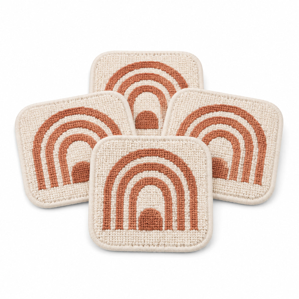 Cream terracotta tufted arch coaster set on a clean white background
