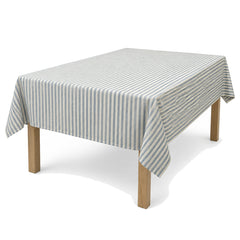 Primeval dusty blue cream thin stripe tablecloth displayed on a rectangular dining table