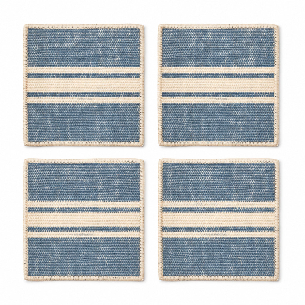 Dusty blue cream woven coaster set on a clean white background
