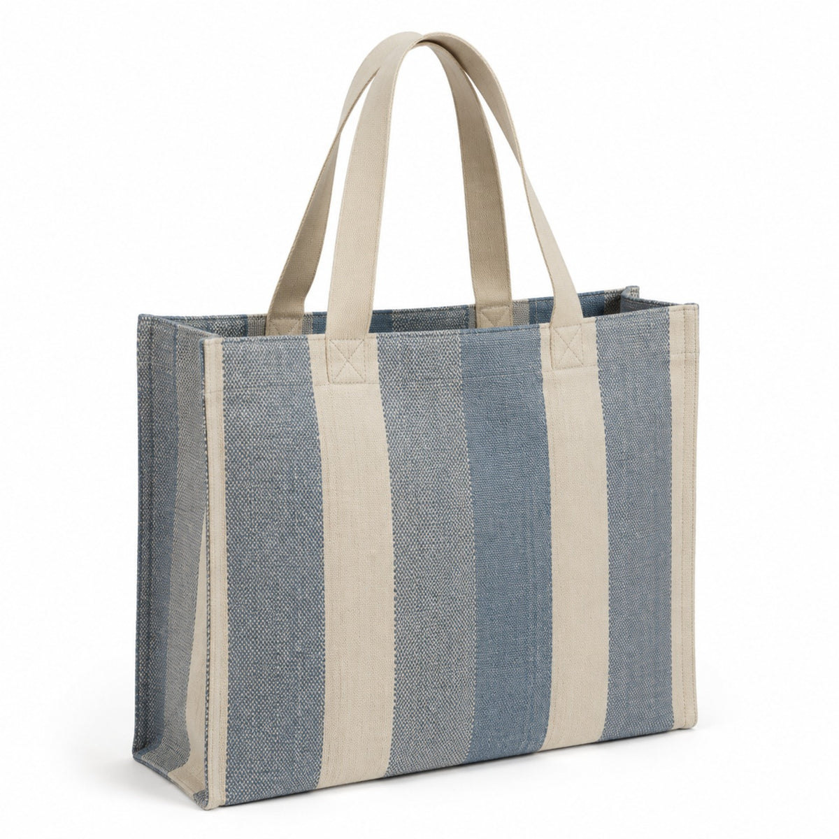 Dusty blue and cream broad stripe woven tote bag with natural handles on a white background.