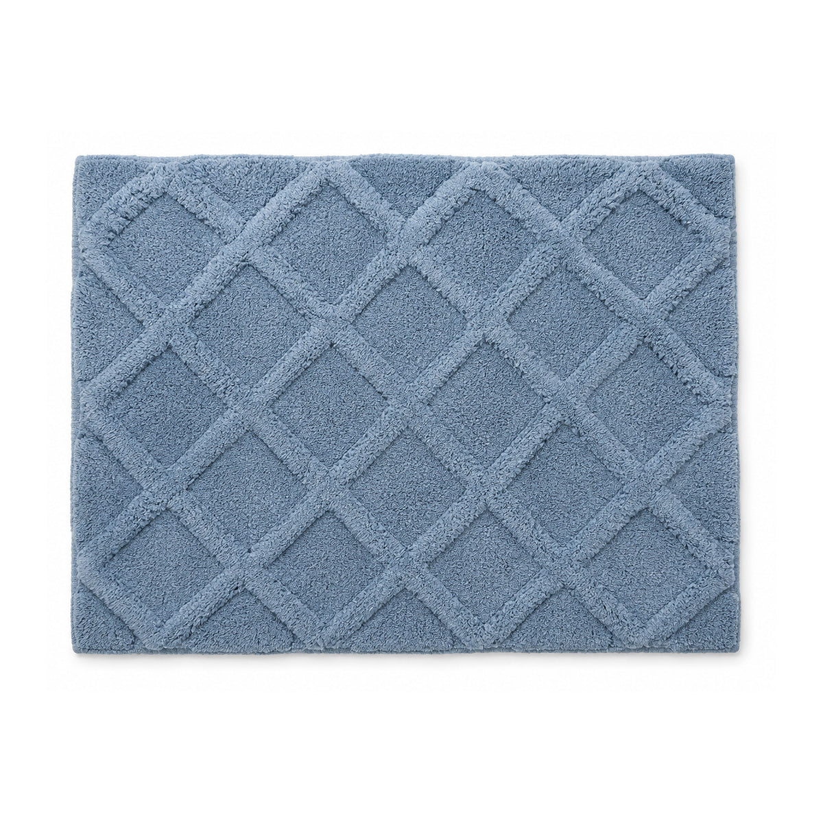 Dusty blue diamond lattice plush bath mat on white background