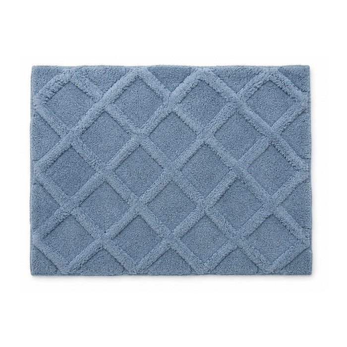 Dusty blue diamond lattice plush bath mat on white background