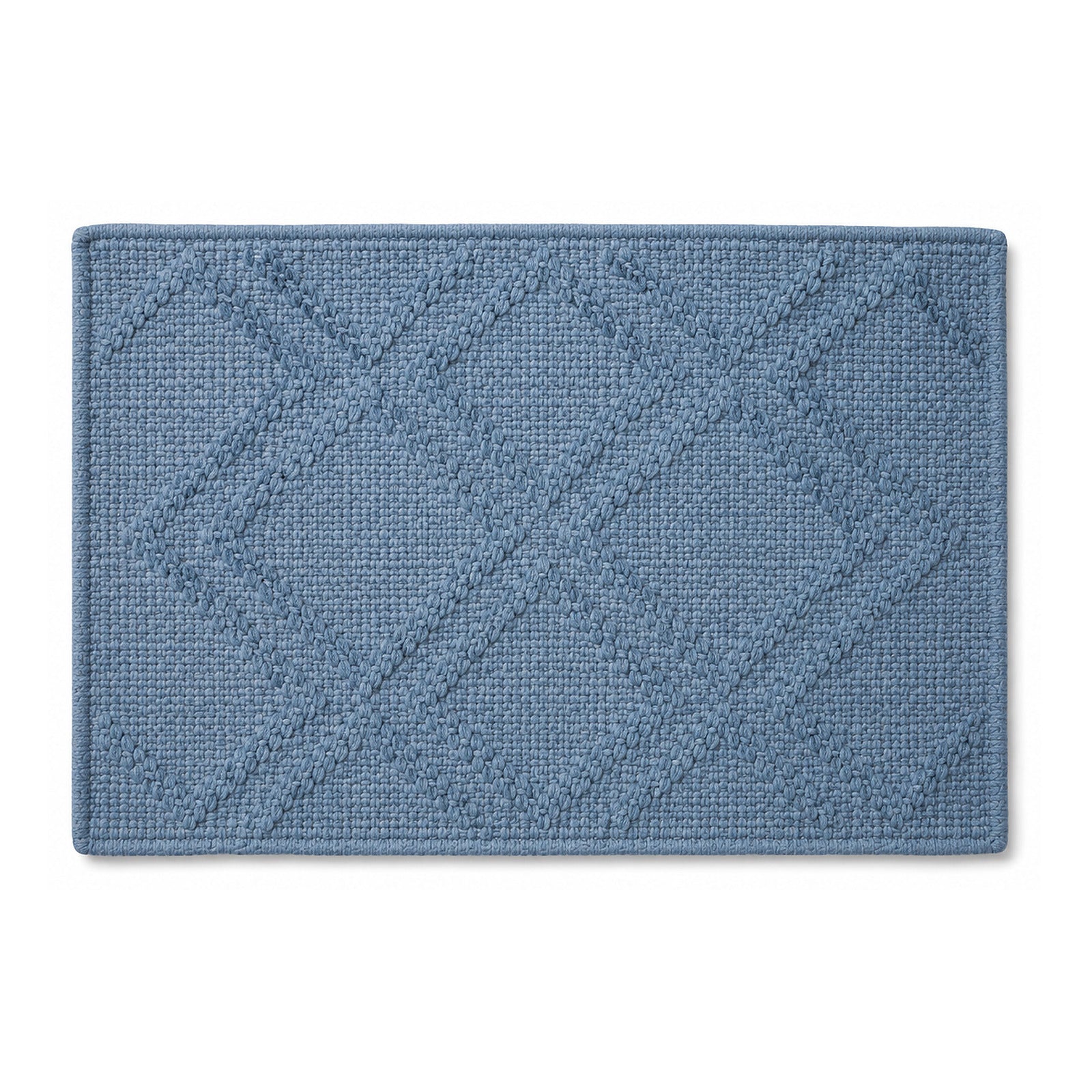 Dusty blue diamond textured bath mat on white background