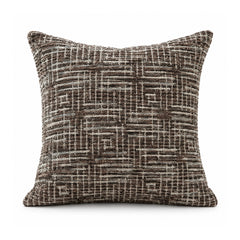 Primeval espresso brown and ivory cushion with dense interlocking linear maze and crosshatch grid motifs