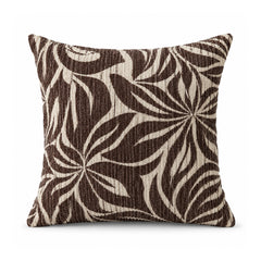 Primeval espresso brown and ivory decorative cushion cover with large overlapping tropical foliage silhouettes