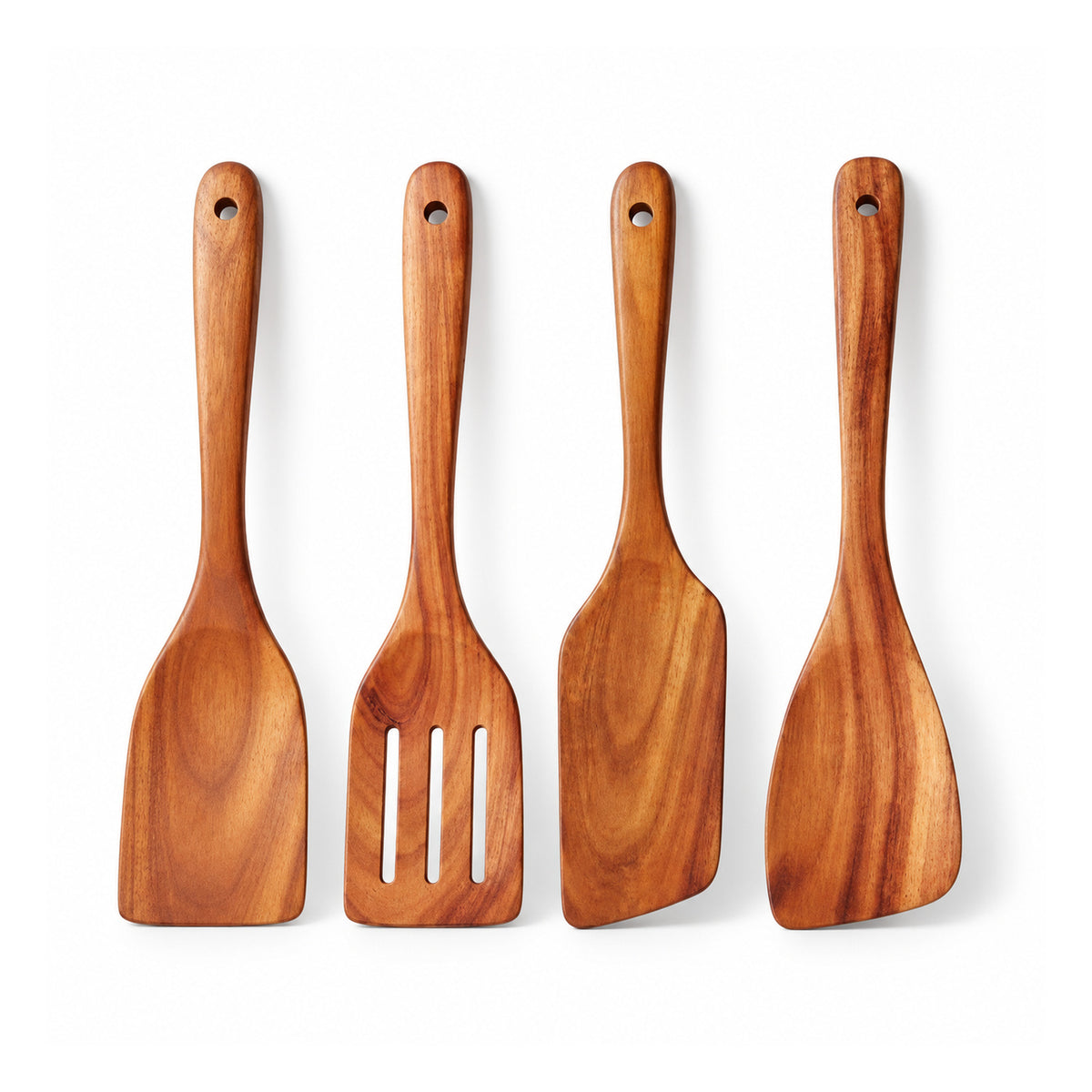 Four warm-brown wooden kitchen spatulas and turners with varied flat or slotted heads and long hanging-hole handles